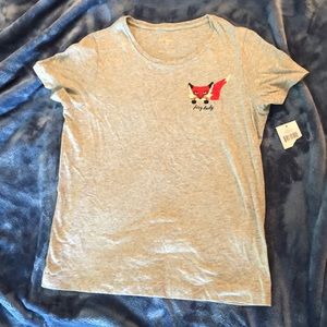 NWT Kate Spade tee shirt. Shirt sleeves, grey, with “Foxy lady” on pocket